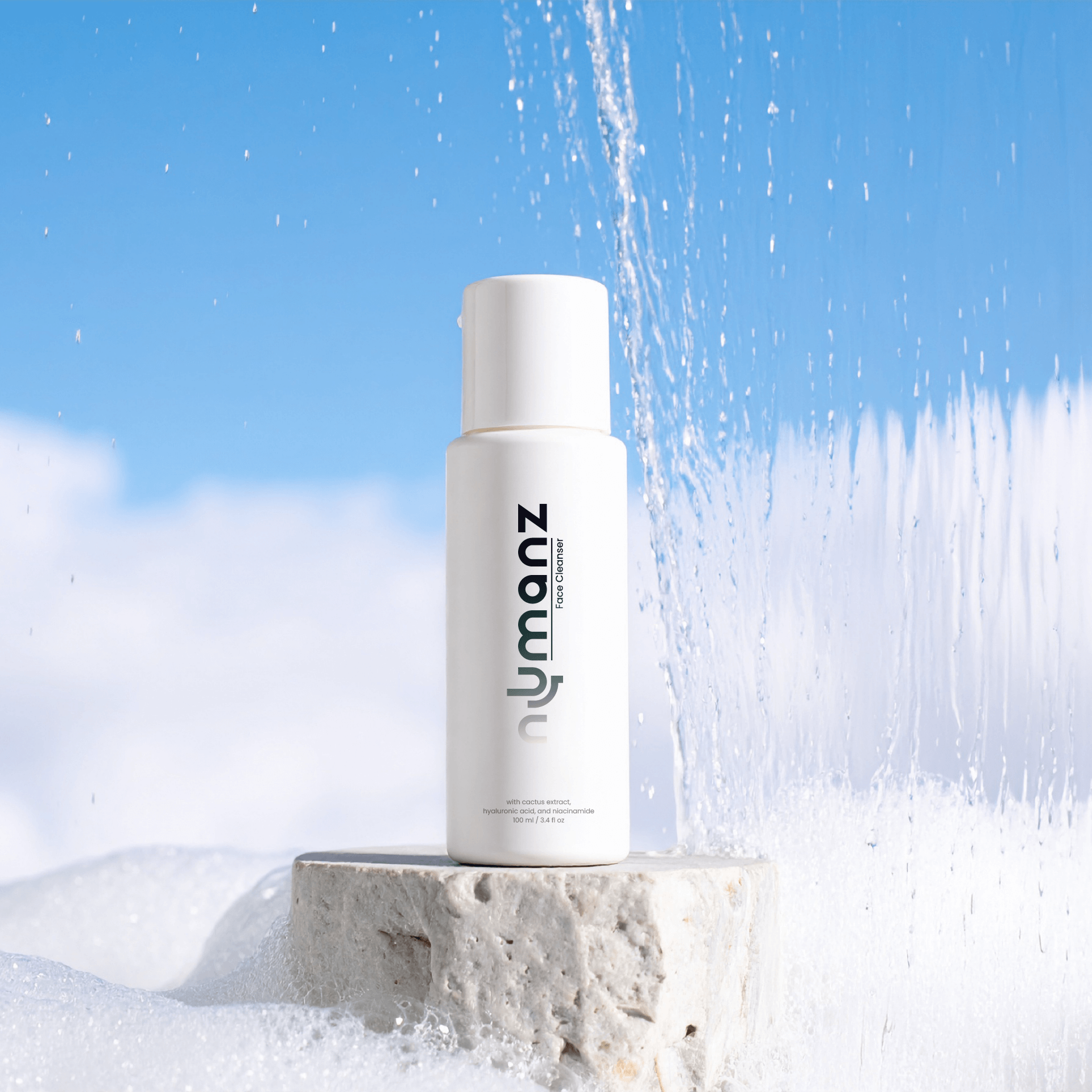 Numanz Face Cleanser Sample bottle with water splash, fresh cleansing skincare for men
