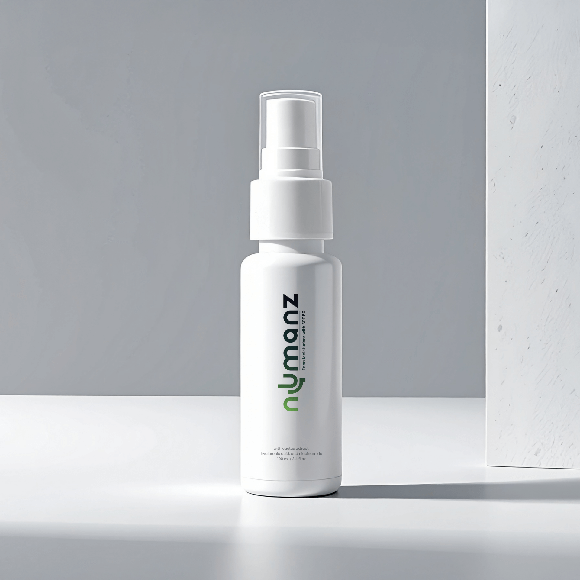 Numanz Face Moisturiser with SPF 50 Sample spray bottle on grey background, lightweight hydration